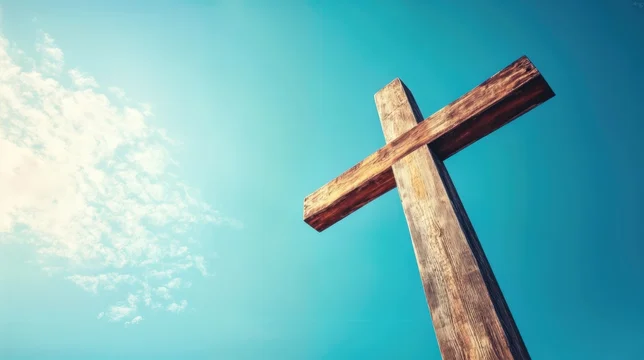Wooden Cross Against Light Blue Sky