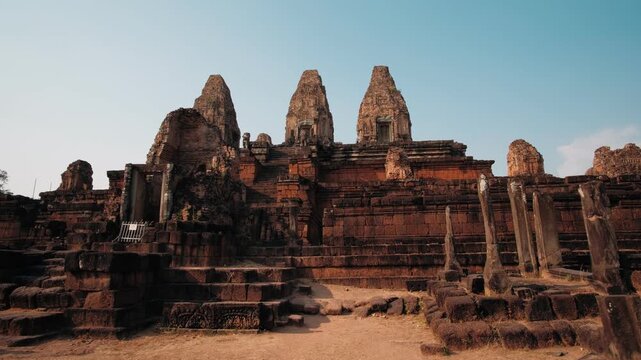 Ruins of the ancient pre rup temple against a clear blue sky. A historic khmer hindu monument and famous landmark in Cambodia, Siem Reap. Archeology concept.