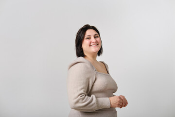 headshot of Adult woman smiling, posing in studio shot © Cristina Garcia