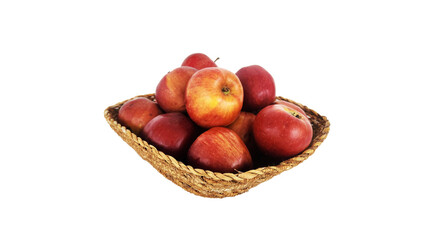In a rustic basket, red apples as delicious winter food isolated on white background
