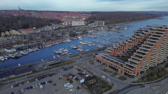 Aerial video of modern marina and terraced waterfront architecture in Aarhus &Oslash;, Denmark