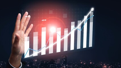A businessman interacts with a digital financial chart, symbolizing growth and success in the market. The upward trend indicates positive performance and opportunities. Copula