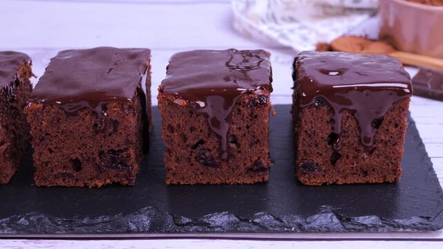 Freshly baked chocolate brownies. Rich texture, chocolate glaze, appetizing details of the dessert. Ideal for culinary projects, food advertising, bakery promotions, recipe videos and food content. 4k