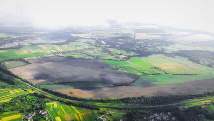 wide panorama angle view aerial drone photography country side agricultural field land meadow misty...