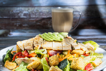 Special house salad with roast chicken.