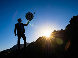 Businessman Achieving Goals on Mountain Peak. Success Business Leadership, Winner on top.