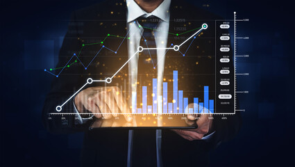 Business professional engages with digital analytics on a tablet, highlighting financial trends and data visualizations for strategic investment planning. Scalp