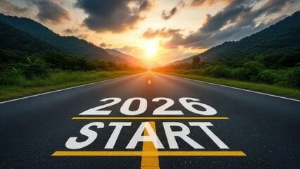 Road leading toward a bright sunrise with the text 2026 start painted on the asphalt symbolizing new beginnings, motivation, and the journey ahead