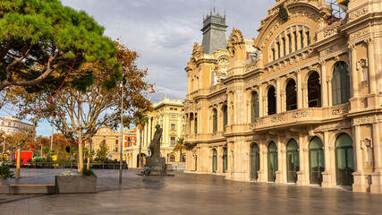 Naklejka premium Classic buildings of the port of Barcelona on a sunny day with a Mediterranean climate, Catalonia, Spain.