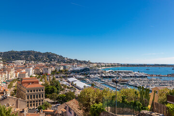 Obraz premium Aerial view of old european city on Cote d'azur seashore on sunny day, Cannes, France