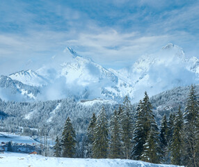 Winter mountain landscape with fir trees (Heiterwang village outskirts, Austria, Tirol)