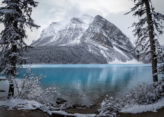 snow covered mountains of lake louise in banff national park