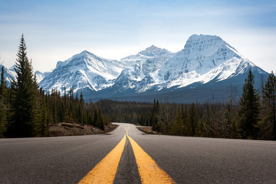 road in the mountains down the icefields parkway banff and jasper