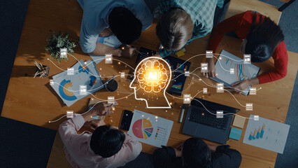 A diverse team collaborates on an artificial intelligence project, analyzing data and visuals on a laptop in a modern office, highlighting teamwork and innovation. Trope