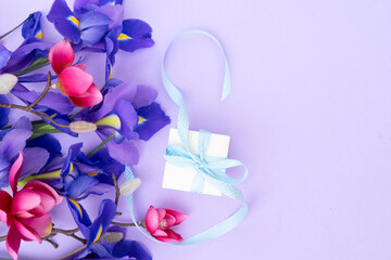 Fototapeta premium Fresh iris flowers with orchids