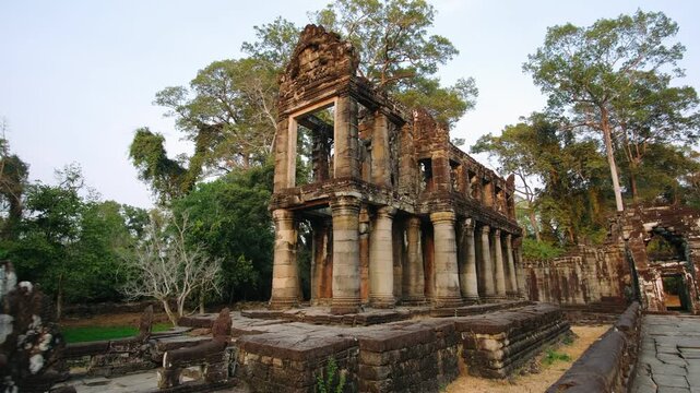 Majestic stone ruins of the preah khan temple standing amidst the lush jungle of angkor thom, cambodia. Ancient khmer architecture and world heritage site UNESCO.