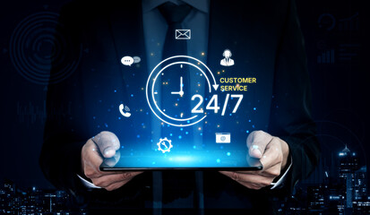 Concept of 24-hour customer service. Providing constant, non-stop support and assistance through...