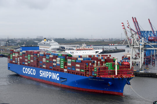 Hamburg, Germany - July 31, 2025: Container ship Cosco Galaxy of the COSCO shipping company is leaving the port of Hamburg, Germany