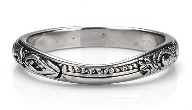 Elegant silver ring with floral engravings on white background