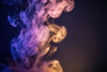 Fototapeta premium Vibrant smoke plumes swirling in different colors