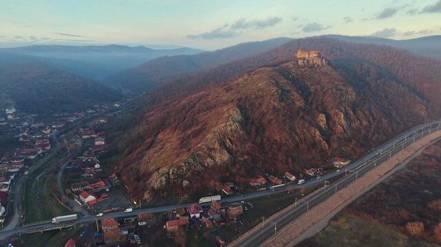 Scenic drone footage in late autumn over the Soimos Fortress in Arad County, Romania, Europe	
