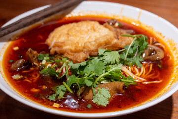 Chongqing noodles, or xiomin, a popular spicy and numbing noodle dish from Chongqing, China