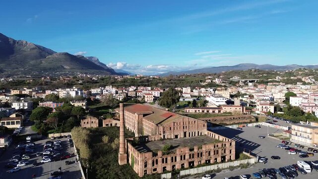 Aerial view of Scauri beach with abandoned old factory construction along the coast 5