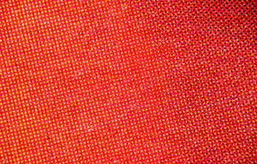 Close-Up of Yellow and Magenta Halftone Print Forming Red Hue