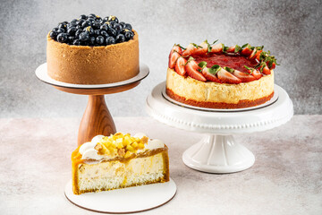 Assorted fruit cheesecakes on stands