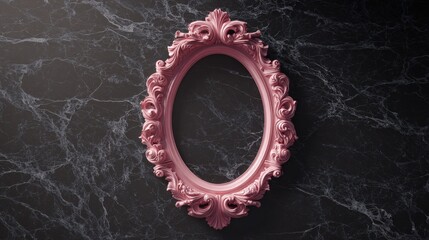A pink frame is on a black marble surface