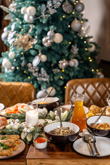 Festive Ukrainian Christmas table with holiday tree