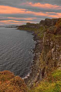 High cliffs south of Loch Mealt falls and Kilt Rock (Creag an Fh&egrave;ilidh) bluffs, rocky wall of basalt and dolerite stone. Isle of Skye-Scotland-114