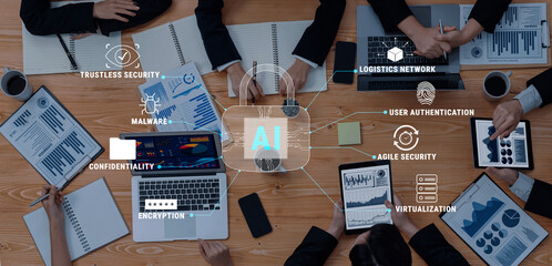 Diverse professionals collaborate using artificial intelligence to enhance security measures and optimize logistics networks in a modern business environment. Trope