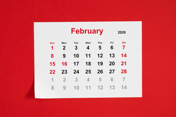 February 2026 Calendar on a Red Background. This February 2026 calendar page features a vibrant red background. Clear print and weekends highlighted in red. Ideal for planning and organizing time.