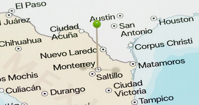 A zoom out of a green pin into Monterrey city of Mexico political map