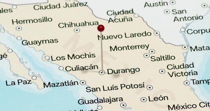 A zoom out of a red pin into Durango city of Mexico political map