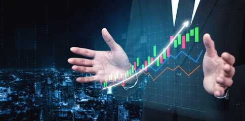 A business professional showcases financial growth with hands raised, surrounded by digital graphs and a vibrant city skyline at night, emphasizing success. Impute
