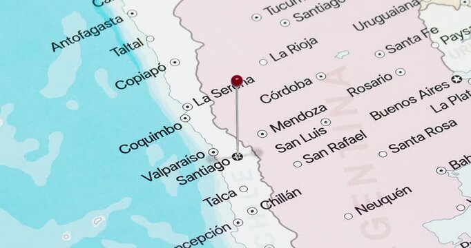 A zoom out of a red pin into Santiago city of Chile political map