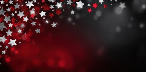 Festive red and silver stars decoration with bokeh effect against dark background.