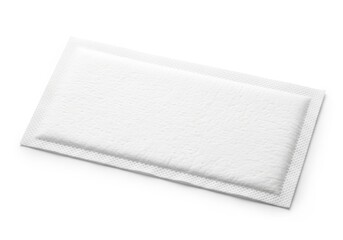 Rectangular absorbent pad lies diagonally on a plain white background