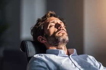 The concept of mental exhaustion and the need for rest shown by an exhausted man relaxing