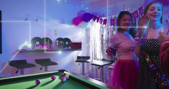 Birthday guests raising drinks after toast, cam panning pool table, animated confetti around drinks