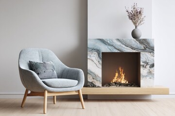 Cozy armchair beside a modern fireplace with a marble surround and glowing fire.