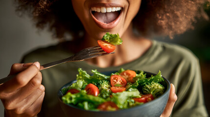 Radiant smile complements a vibrant salad, showcasing health and wellness through mindful nourishment.