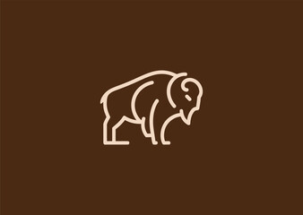 A geometric simple line bison logo with bold angular contours forming its head and hump, symbolizing strength, resilience, and grounded power
