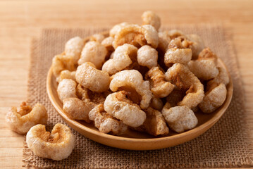 Pork rind on a wooden plate, Northern Thai food