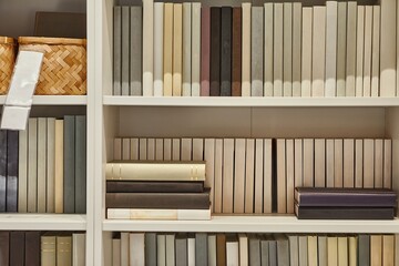 Books on a shelf in a room