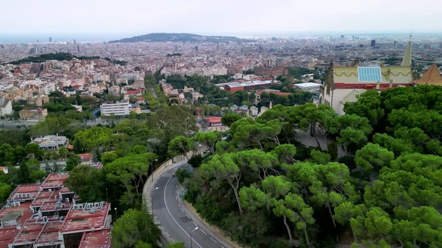 Epic Barcelona fairy castle aerial orbit. 
Cinematic 4K drone panorama of historic 
modernist Casa Arnus palace and historic 
funicular railway on Tibidabo hill.

