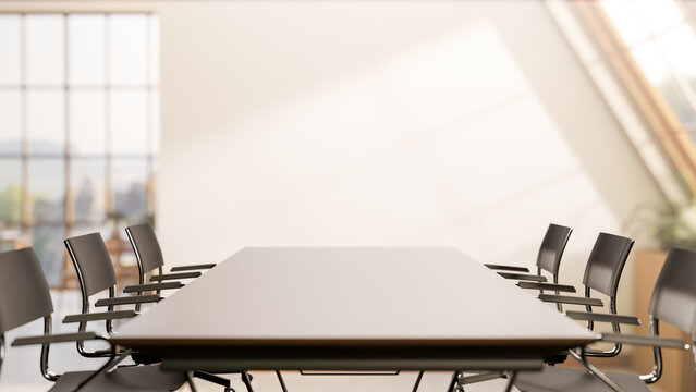 Long black table and swivel chairs in office company meeting room with sunlight through roof window.