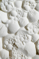 Close up of Abstract Background of Light Textured Powder